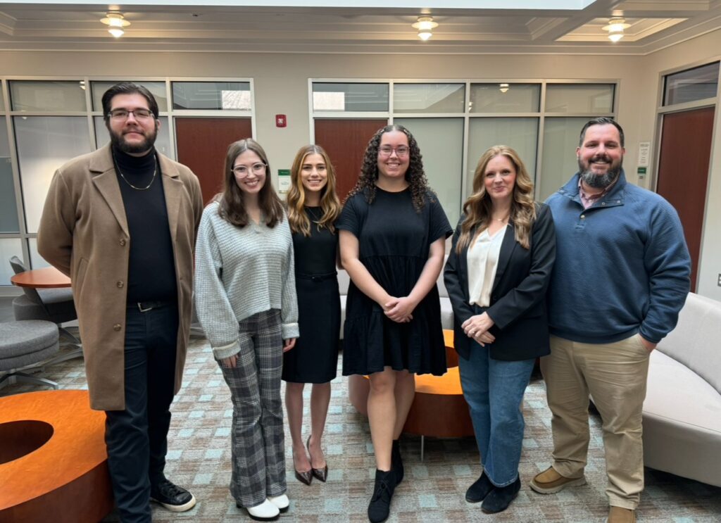 Group photo taken between students and the staff with The Jordan Creek Candle Company.